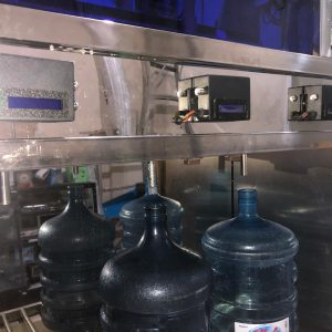 Sistem Pengisian Air Minum Isi Ulang Otomatis | Cepat, Akurat & Higienis